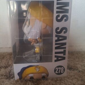 Funko Pop! Santa Figure - Yellow and Blue